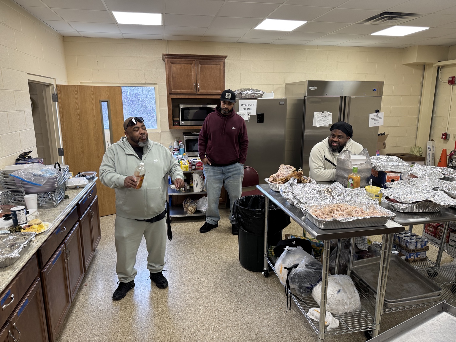 Kitchen volunteers preparing food for Community Thanksgiving
