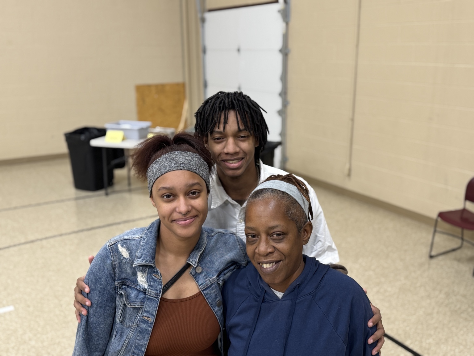 Community Thanksgiving guests smiling together