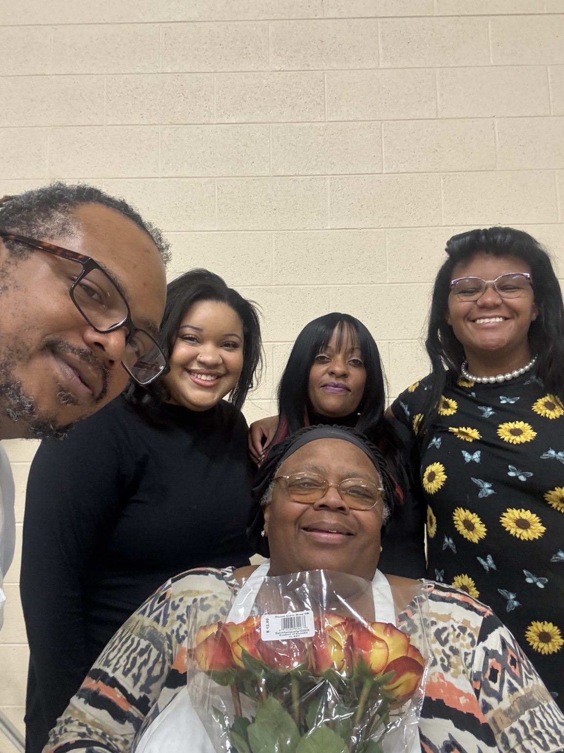 Community members smiling together at Thanksgiving