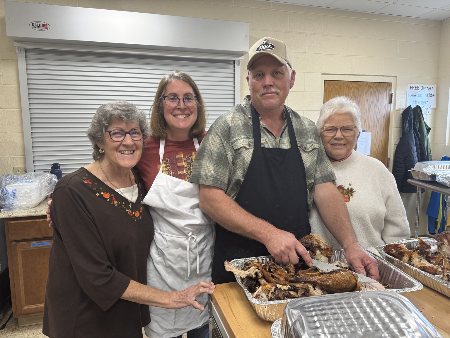 Volunteers preparing food together